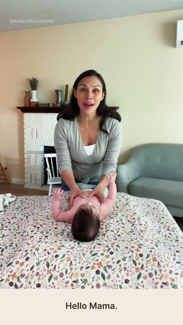 Hands guiding a baby through the five-minute routine